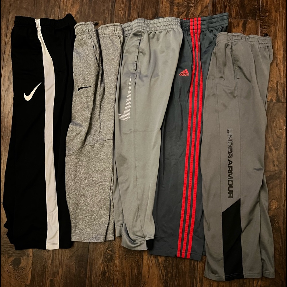 Boys size L 5 pairs of pants - under armour, Nike, adidas